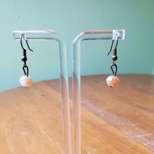 NWOT earrings, dangling, white/amber colored stone